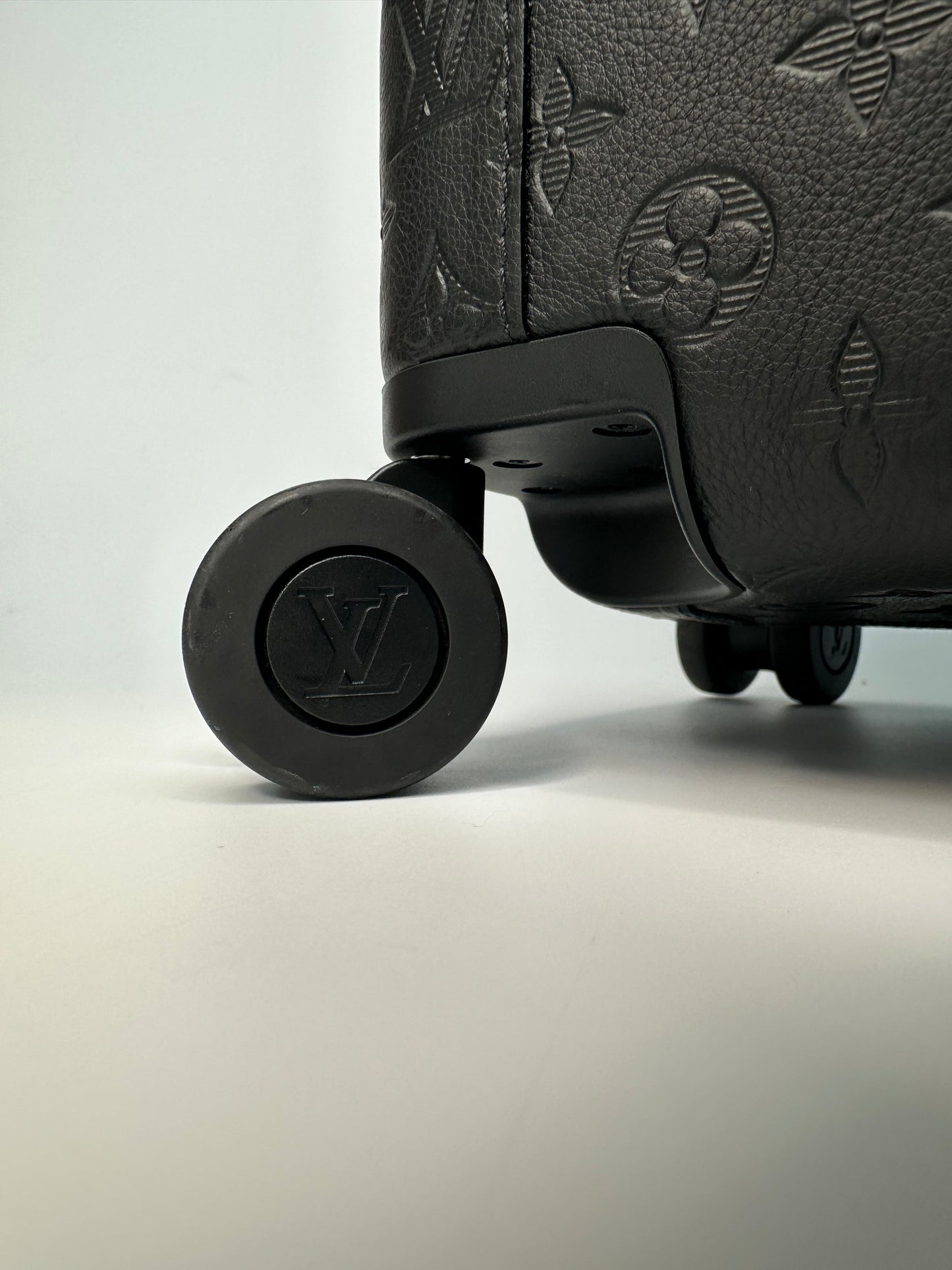 Louis Vuitton Horizon 55 carry-on suitcase in Monogram Shadow leather